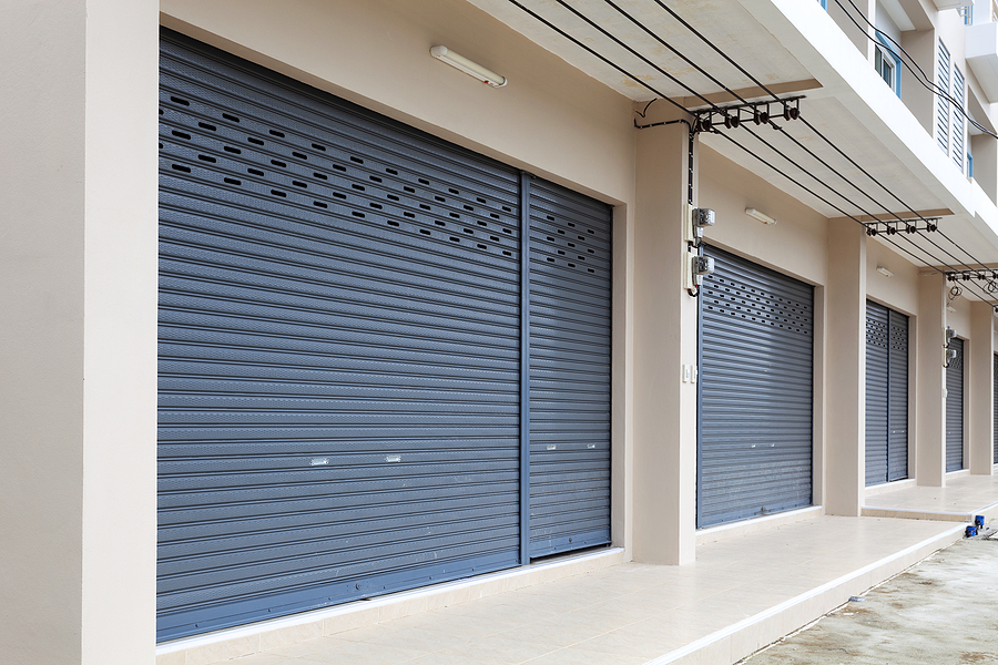 Shutter Door Or Roller Door And Concrete Floor Of Commercial Building